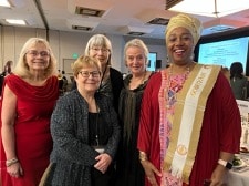 Fig 1. Drs Bev Johnson, Shelley Ross, Tuula Saarela, Clarissa Fabre and Eleanor Nwadinobi gather at the gala for the North American Regional Meeting of MWIA