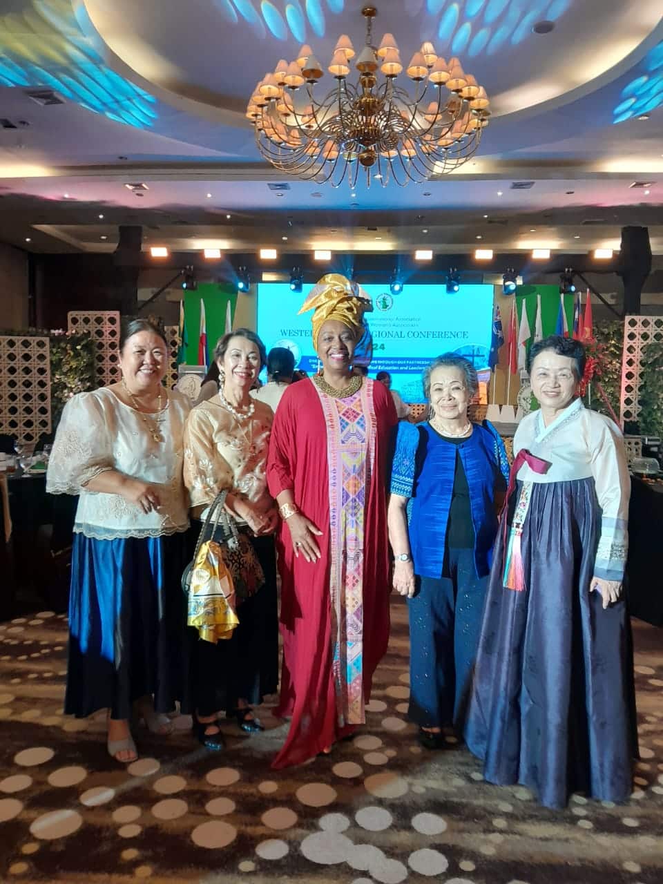 Fig 2.Friendship night: from left : Maria Victoria Villarica (VP, PMWA), Rosa MAria Nancho ( Chair, Scientific Committee, LOC), Eleanor, Vivina Chiu(President, PMWA), Bong