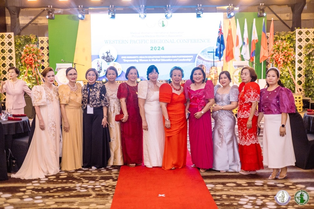 Dr Vivina Chiu (in orange dress) with Philippine women doctors